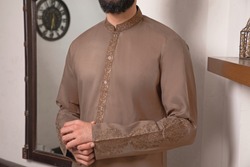 Men's fabric kurta, shalwar kameez, cotton, boski, karandi latest embroidered style with beautiful modeling and photography.