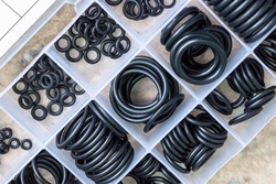 A set of rubber sealing gaskets. Rubber rings for creating tight connections in the automotive, marine and aviation industries.