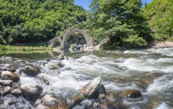 Ancient stone bridge over Arda river, Rhodope mountain, Bulgaria