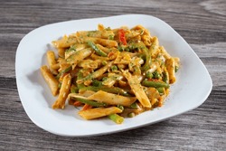 A view of a plate of rasta pasta.