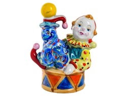 Porcelain ceramic figures colourful cute Clown isolated on white background. painted collectibles vintage Antiques art decor. Use for interior.