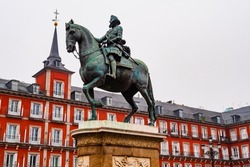 Stunning view of Plaza Mayor with statue of King Philip III in foreground, Madrid, Spain
