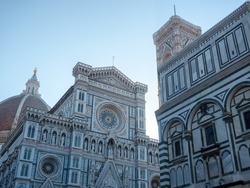 Exterior of The Florence Cathedral (Cattedrale di Santa Maria del Fiore), The Giotto's Campanile (Giotto's bell tower) and The Florence Baptistery (Baptistery of Saint John) in Tuscany, Italy