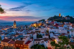 Sunset in Velez Malaga, On the left you can see the church of San Juan Bautista and on the right the castle of Velez Malaga.