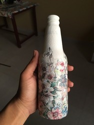 Vintage Decoupage bottle art on a small bottle