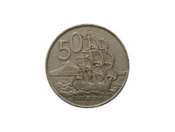 Reverse of New Zealand coin 50 cents with image of Endeavour ship, isolated in white background. Close up view.