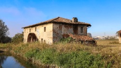 Old abandoned water mill in north italy