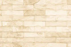 Brick wall art concrete stone texture background in wallpaper limestone abstract paint to flooring and homework/Brickwork or stonework clean grid uneven interior rock old.