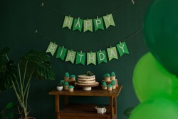 Birthday party table decoration, Happy Birthday inscription and baking