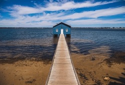 the famous and touristic Blue Boat House at Swan River during a sunny blue sky day in Perth - Western Australia