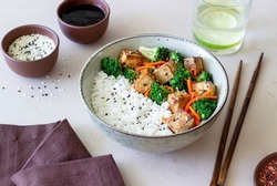 Rice with tofu, broccoli, carrots and sesame. Healthy eating. Vegetarian food