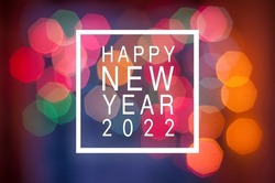 Christmas holiday festive glittering defocused colorful background with bokeh lights Happy new year 2022