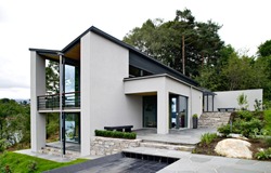 Front view of modern designed concrete residential house in western Norway