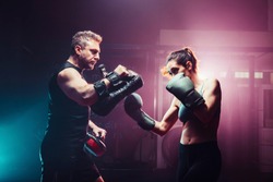 male trainer gives self-defense classes to female fighter - uppercut short, boxing, training