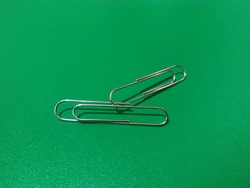 A paper clip or clip is a device for combining two or more sheets of paper based on the pressure principle. Paper clipped with clips can be easily removed again.
