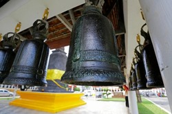 Buddhist bells, known as Bonsho, are seen in Wat Chai Mongkron temple, Pattaya city, Thailand, during the Songkran Thai New Year celebrations.