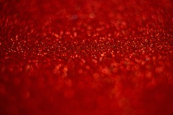 red texture and shimmering bokeh