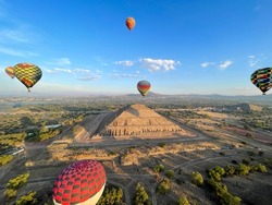 Colorful Hot Air Balloons Flying Over Ancient Pyramid of Teotihuacan, Mexico