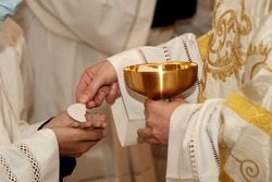 Communion rite during mass in a Catholic church