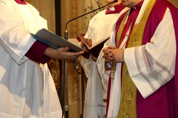 Priest celebrates mass in a Catholic church. Sunday Mass