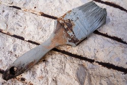 Old used rusty paint brush
