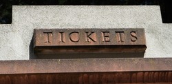 Tickets sign carved in stone