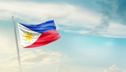 Philippines national flag waving in beautiful sky.