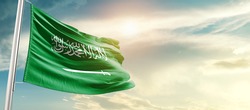 Saudi Arabia national flag waving in beautiful sunlight.