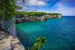 Pictured Rocks National Lakeshore - Scenic Great Lakes Shoreline Landscape - Pure Michigan Lake Superior Shoreline At Grand Portal Point - A Natural Arch In Cliffs Meet Water