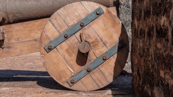 A wooden old wheel in close-up