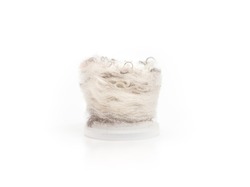 Small vacuum filter with pile of pet fur, hair and dust debris. Full cyclonic Vacuum canister content after cleaning. White twisted and turned hair clump pile. Selective focus. Isolated on white.