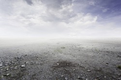 Beautiful gravel background with gravel mist and clouds  