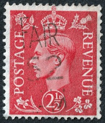 POLTAVA, UKRAINE - APRIL 27, 2019. Vintage stamp printed in Great Britain 1941 shows , King George VI