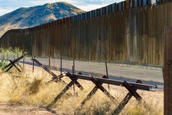 The border wall in southern Arizona that separates the United States from Mexico. 