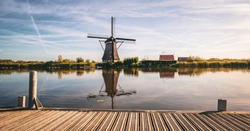 Traditional Dutch Windmill near the Canal. Netherlands - Kinderdijk