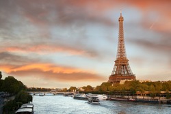 Eiffel Tower with boats in evening  Paris, France