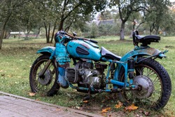 
Old, rusty, broken Soviet motorcycle
