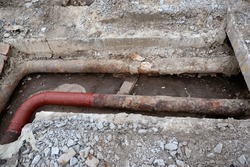 Replacement of old sewer pipes.Old worn-out excavated water pipes. The concept of repair and connection of water or gas installations