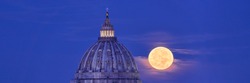 St Peter's Basilica Dome with Full Moon in the Background. Real View of the Moon Actually Passing Behind the Vatican in Rome. Easy to Crop for Editorial, Commercial, Personal Use