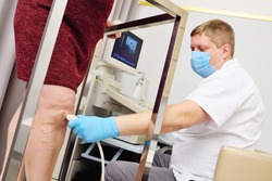 A phlebologist or vascular surgeon performs an ultrasound examination of the patient's veins. Prevention of varicose veins, thrombosis, rosacea. Prevention of varicose veins, thrombosis, rosacea.