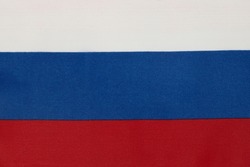 Russian flag. The texture of the background of the flag of the Russian Federation.