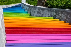 Colorful stairs on a sunny day. Beautiful rainbow colored stairs