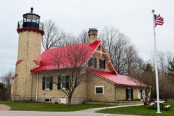 McGulpin Point Light was constructed as a navigational aid through the Straits of Mackinac. The lighthouse began operation in 1869, making it one of the oldest surviving lighthouses in the Straits.  
