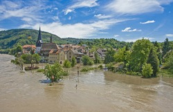 flood due to heavy rainfall at Neckargemund at the Neckar river in southern Germany in early summer