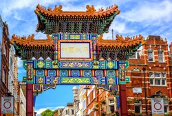 London Chinatown entrance gate in traditional chinese design, England, United Kingdom. 