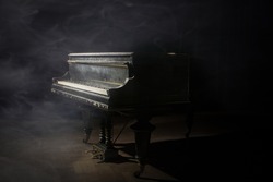 Old grand piano on the stage