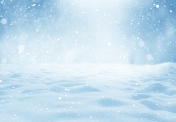 Christmas winter background with snow and blurred bokeh. Happy new year greeting card with copy-space.