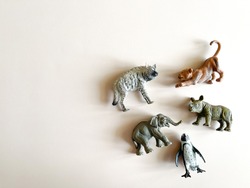 
Figures of animals on a white background Children's toys: rhino, hippopotamus, zebra. The concept of children's play, montessori. many pieces to play. A gift for a child. Animal protection.