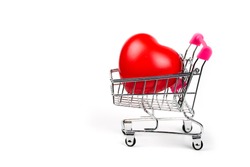 Red Heart in shopping cart or trolley Isolated On White Background.Blood pressure control-Health care concept.Valentine Concept.