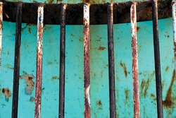 set of a rusty steel fence,rusted metal bars.Rust of metals.Corrosive Rust.